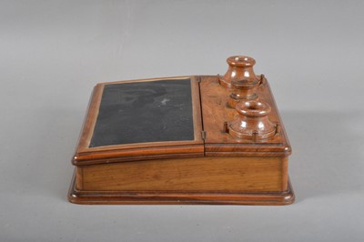 Lot 126 - A 19th century olivewood and stoneware inkwell