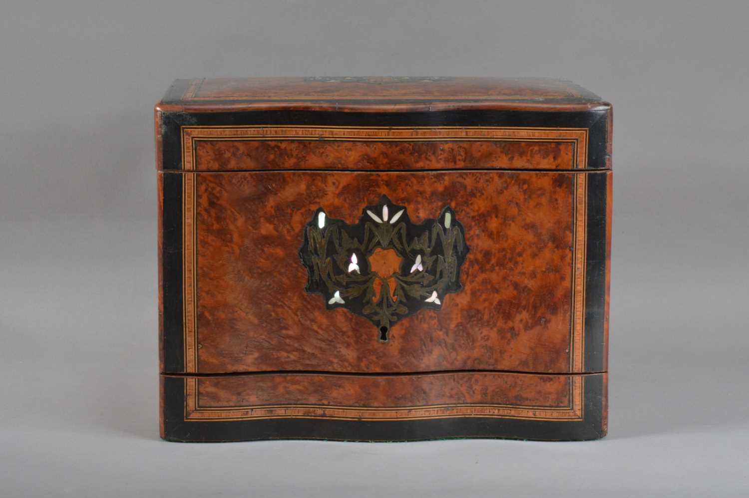 Lot 131 - A regency burr walnut veneered ebonised and boxwood inlaid decanter box
