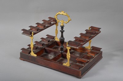 Lot 131 - A regency burr walnut veneered ebonised and boxwood inlaid decanter box