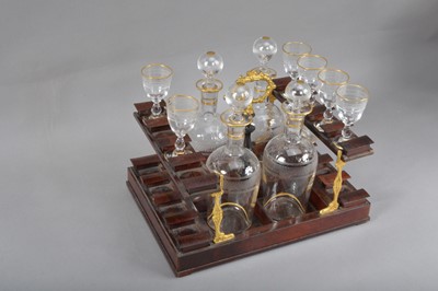 Lot 131 - A regency burr walnut veneered ebonised and boxwood inlaid decanter box