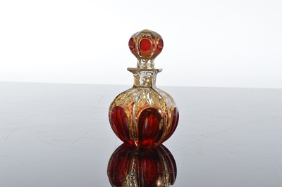 Lot 102 - Four pretty cut glass scent bottles