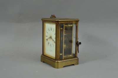 Lot 98 - A late 19th/ early20th century brass carriage clock