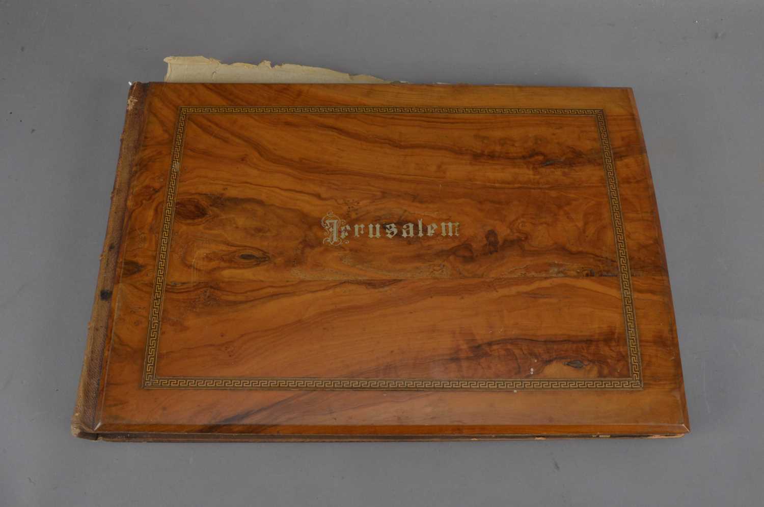 Lot 174 - A Jerusalem album containing pressed flowers