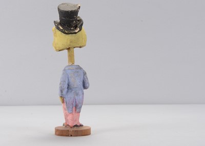 Lot 7 - A late 19th  or early 20th century Thüringen frog in top hat nodder
