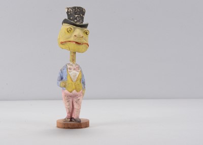 Lot 7 - A late 19th  or early 20th century Thüringen frog in top hat nodder