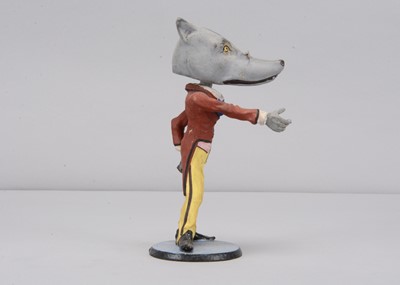 Lot 13 - A late 19th century Thüringen anthropomorphic wolf nodder