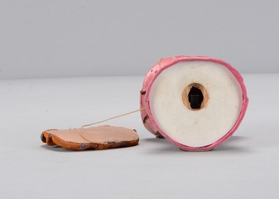 Lot 21 - A late 19th century novelty gentleman popping up from a pink silk corset