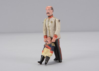 Lot 27 - A late 19th century Thüringen Bismarck grabbing the ears of Napoleon III