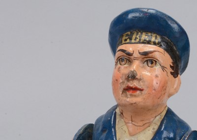 Lot 34 - An Albin Amende Sonneberg German navy sailor from the SMS Eber and black man wresting toy, circa 1888