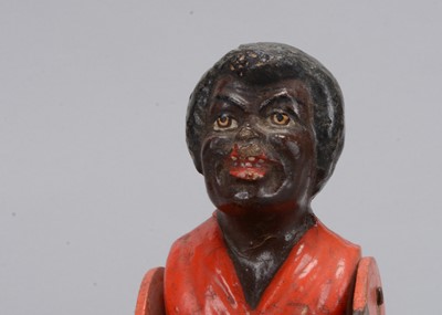 Lot 34 - An Albin Amende Sonneberg German navy sailor from the SMS Eber and black man wresting toy, circa 1888