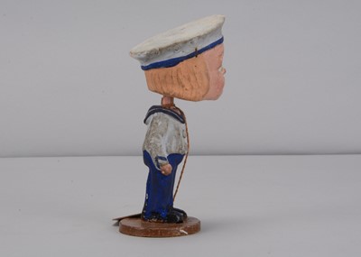 Lot 52 - An early 20th century Thüringen composition comic boy nodder