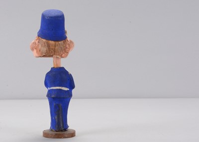 Lot 55 - An early 20th century Thüringen Palmer Cox Brownie policeman nodder