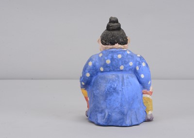 Lot 61 - A late 19th century German composition Mama Katzenjammer  candy or sweet container