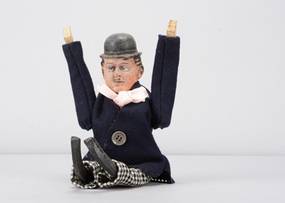 Lot 64 - An early 20th century German composition headed Charlie Chaplin clockwork tumbling toy