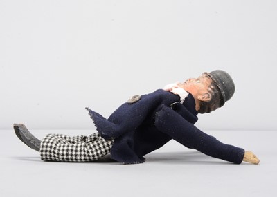 Lot 64 - An early 20th century German composition headed Charlie Chaplin clockwork tumbling toy