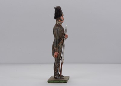 Lot 72 - A mid to late 19th century papier-mâché soldier