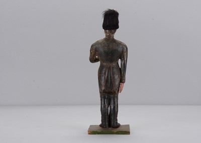 Lot 72 - A mid to late 19th century papier-mâché soldier