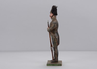 Lot 72 - A mid to late 19th century papier-mâché soldier