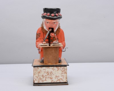 Lot 74 - A mid to late 19th century Thüringen Yeomen of the Guard (Beefeater) eating a sausage crank handled ‘eater’