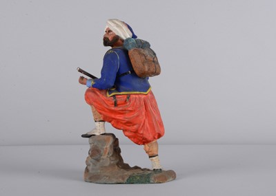 Lot 85 - A fine mid 19th century German papier-mâché Zouave foot soldier nodder