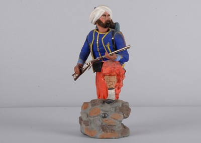 Lot 85 - A fine mid 19th century German papier-mâché Zouave foot soldier nodder