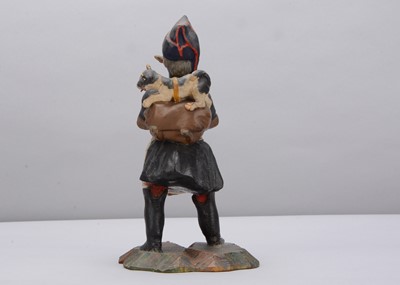 Lot 87 - A mid 19th century German knitting veteran nodder