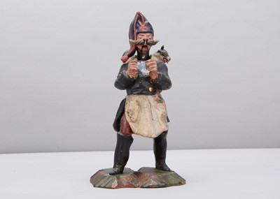Lot 87 - A mid 19th century German knitting veteran nodder