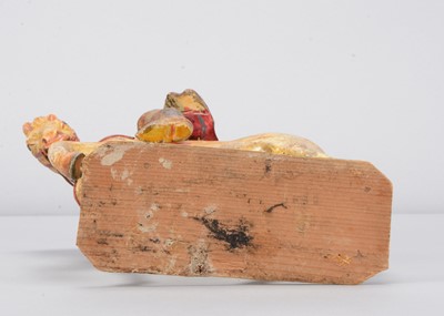 Lot 93 - A mid 19th century Germany carved wooden mounted red Hussar, possibly Oberammergau
