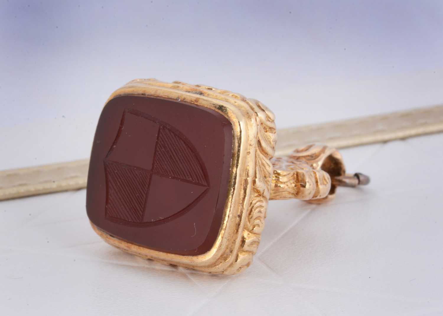 Lot 1 - A 19th Century carnelian gilt metal fob seal