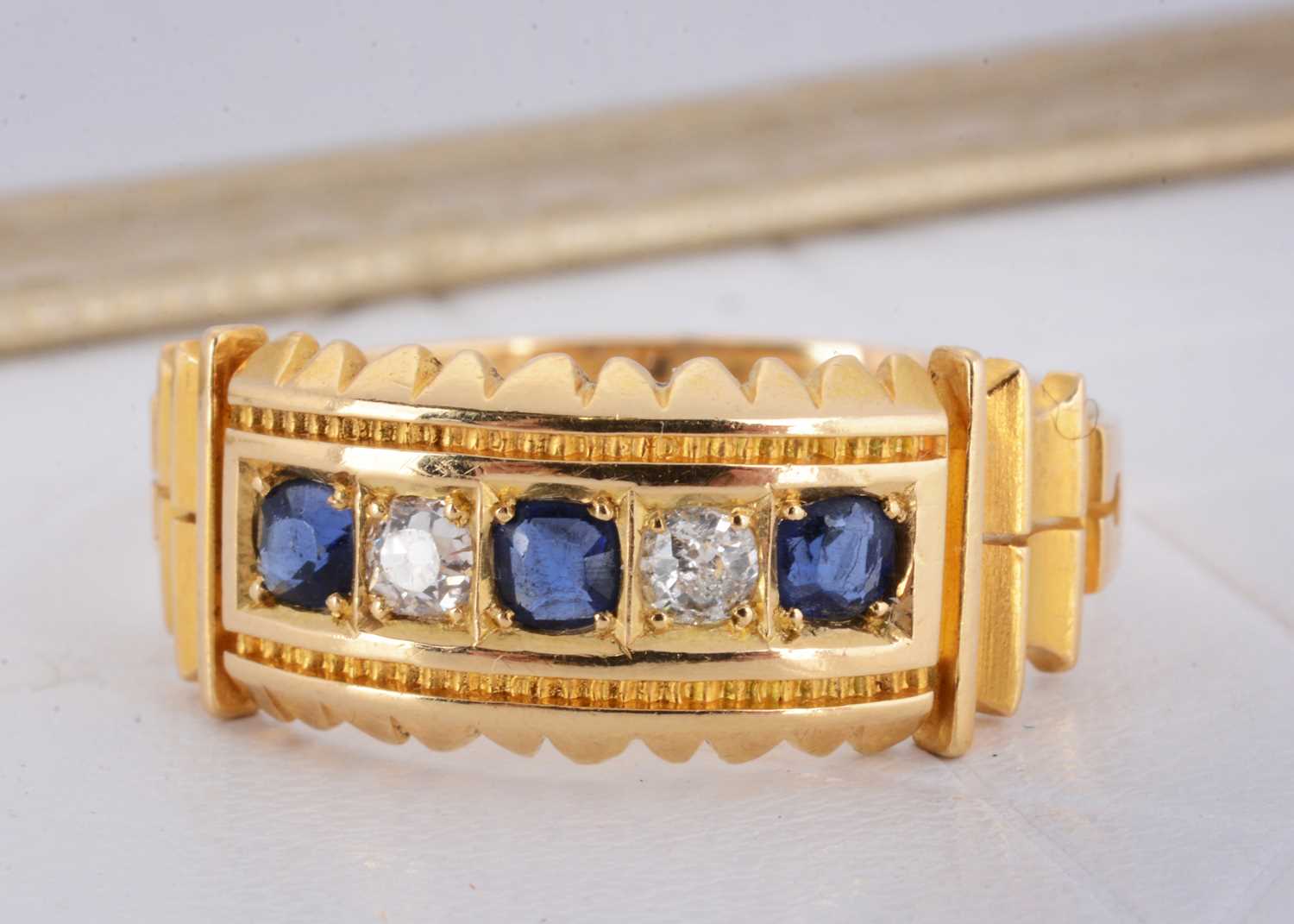Lot 3 - A Victorian 18ct gold five stone sapphire and diamond ring