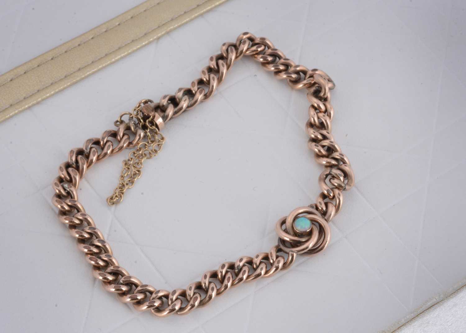 Lot 14 - An Edwardian gold plated curb link bracelet