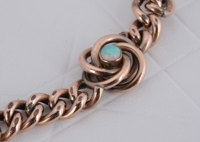 Lot 14 - An Edwardian gold plated curb link bracelet