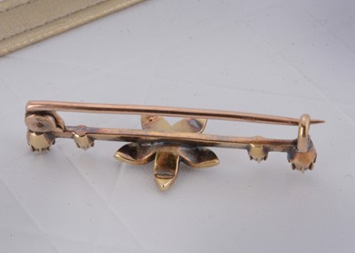 Lot 16 - An Edwardian gold and seed pearl bar brooch