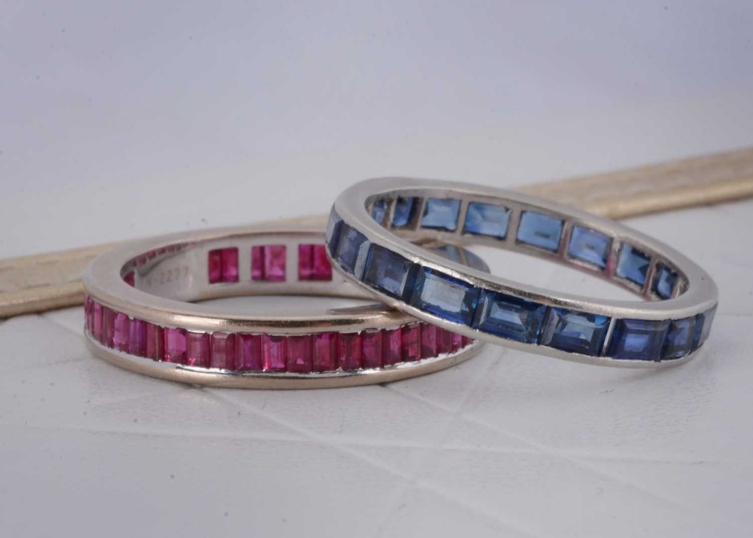 Lot 20 - Two gem set eternity bands