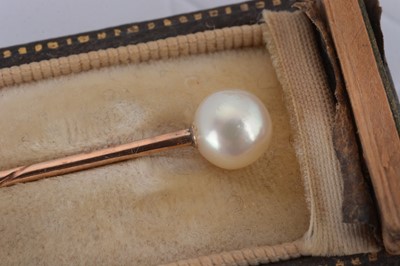 Lot 22 - An Edwardian natural pearl stick pin