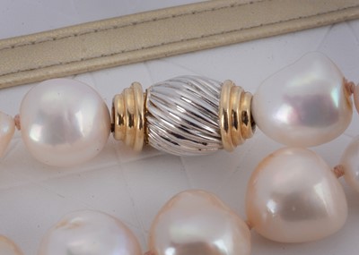 Lot 23 - A string of fireball cultured pearls