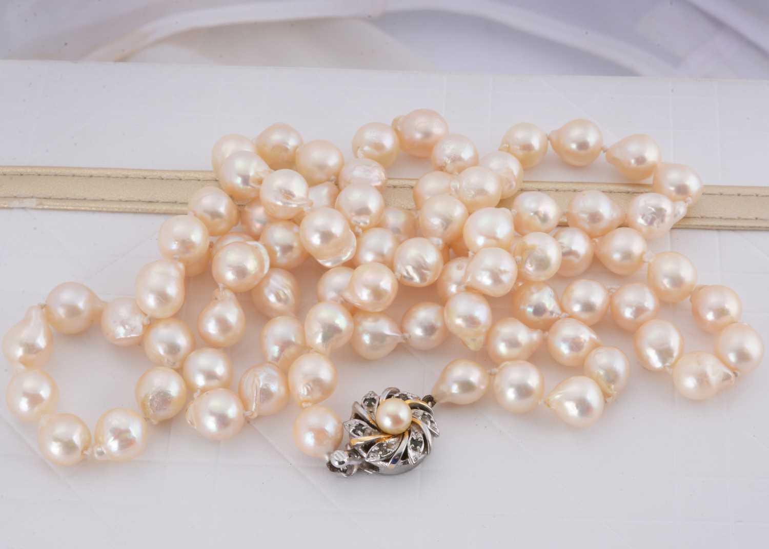 Lot 28 - A long string of Baroque cultured pearls