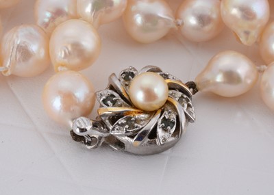 Lot 28 - A long string of Baroque cultured pearls