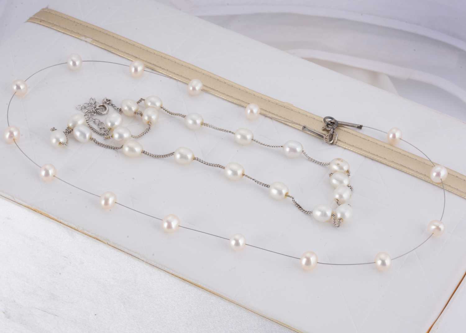 Lot 30 - A cultured pearl and silver necklace