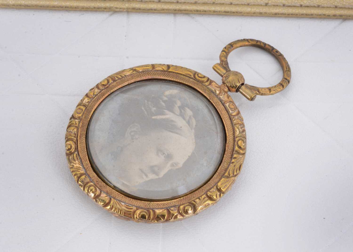 Lot 42 - A 19th Century gilt metal circular locket