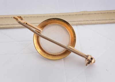 Lot 49 - An Edwardian moonstone and seed pearl bar brooch