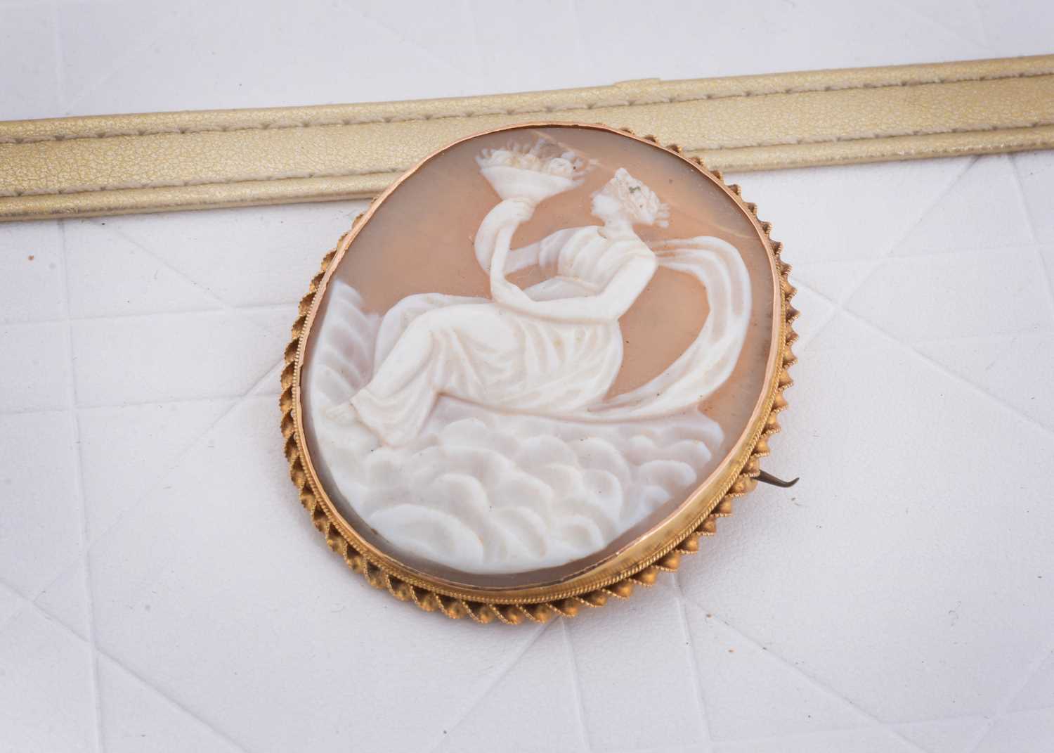 Lot 50 - A 19th Century carved shell cameo brooch