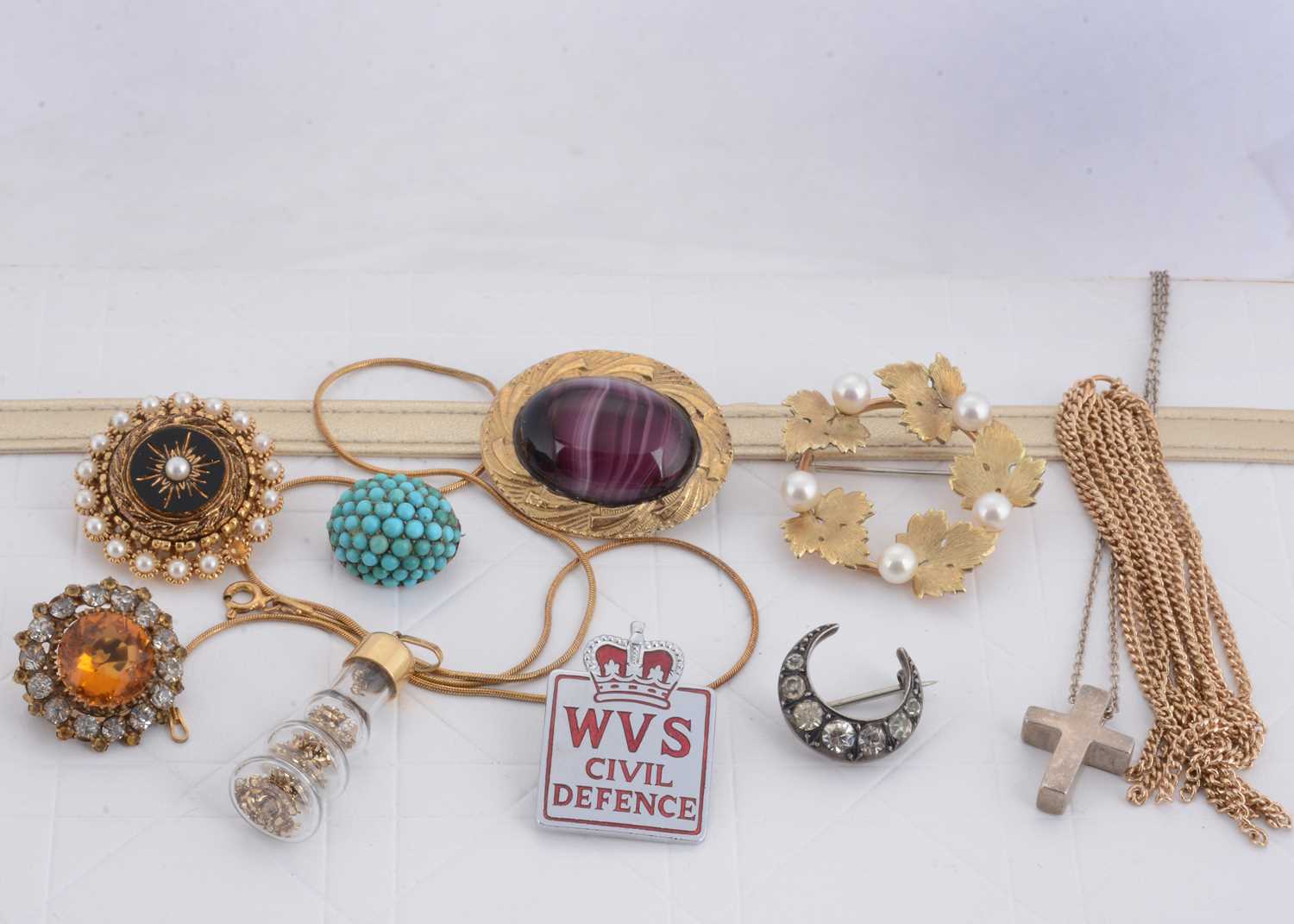 Lot 57 - A 19th Century turquoise and silver set oval brooch