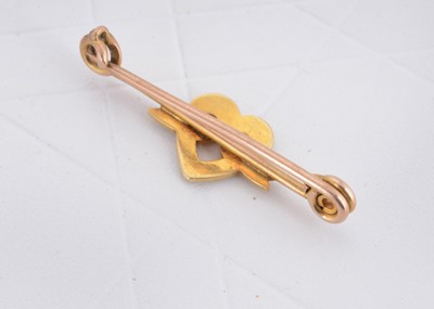 Lot 59 - An Edwardian seed pearl safety pin bar brooch