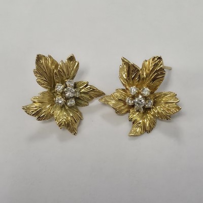 Lot 69 - A pair of Kutchinsky 18ct gold and diamond leaf earrings