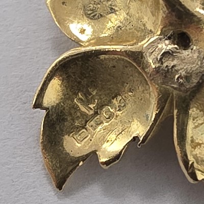 Lot 69 - A pair of Kutchinsky 18ct gold and diamond leaf earrings