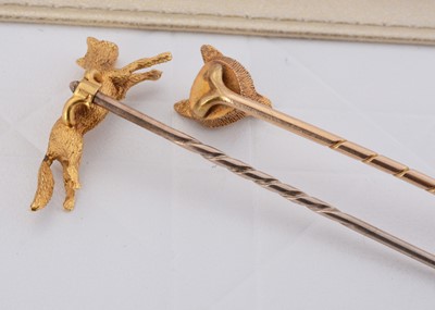 Lot 73 - Two hunting yellow metal stick or stock pins