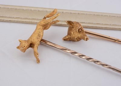 Lot 73 - Two hunting yellow metal stick or stock pins