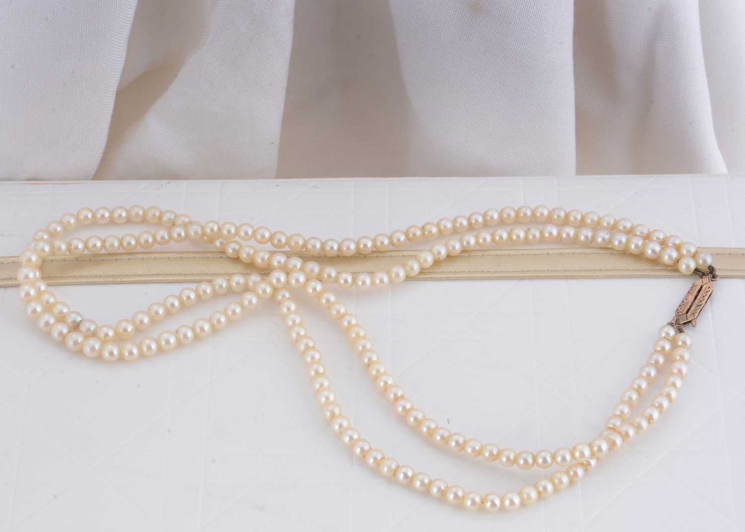 Lot 76 - A slightly graduated double row cultured pearl necklace