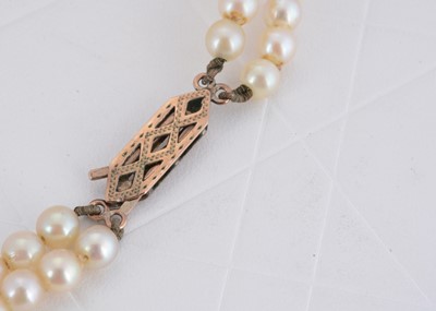 Lot 76 - A slightly graduated double row cultured pearl necklace
